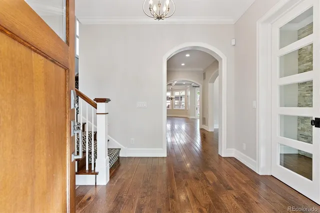 a view of entryway with wooden floor