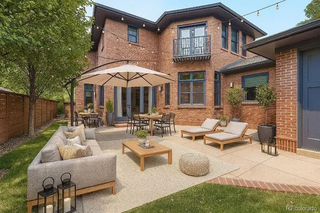 a view of a backyard with a slide and wooden fence