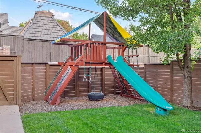 an aerial view of a house with a garden
