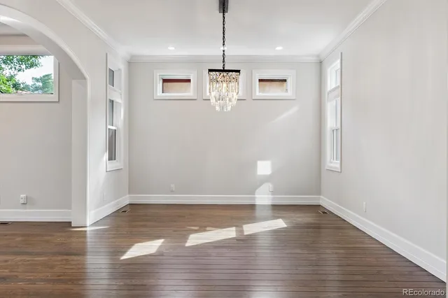a view of a livingroom with wooden floor