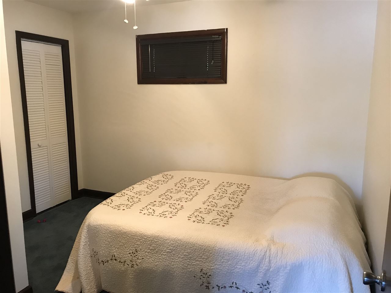 7632 North River Road Byron, IL 61010 - Photo 11 of 15 a bedroom with a bed and a tv