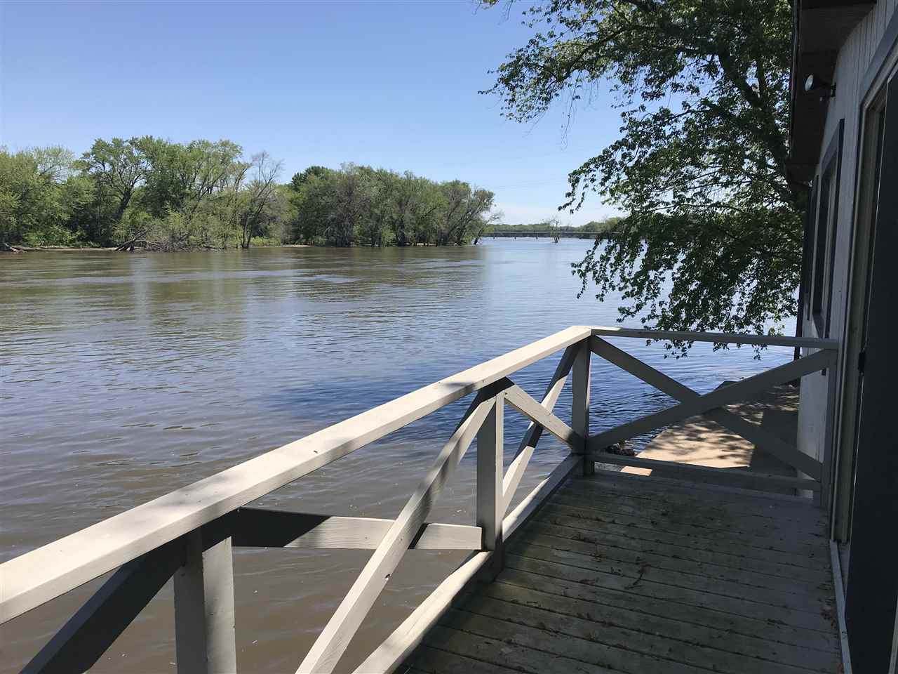 7632 North River Road Byron, IL 61010 - Photo 13 of 15 a view of a lake with a lake