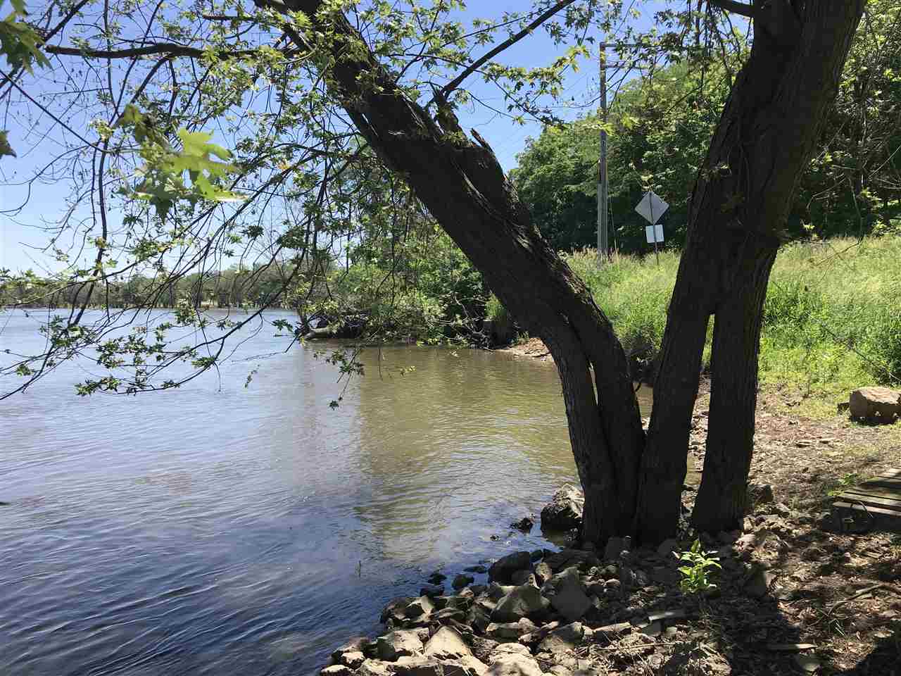 7632 North River Road Byron, IL 61010 - Photo 14 of 15 a view of lake with a tree