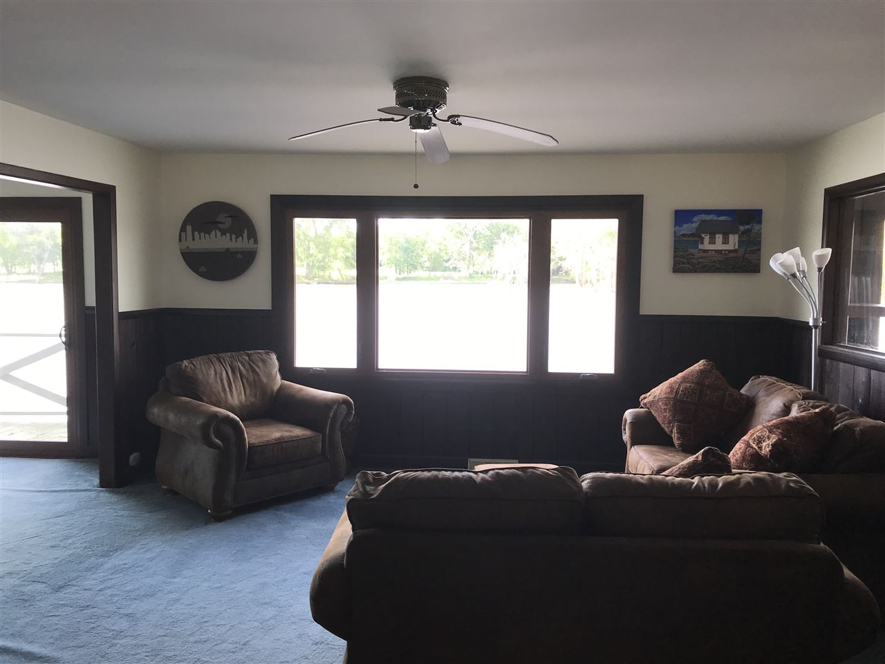7632 North River Road Byron, IL 61010 - Photo 6 of 15 a living room with furniture and a window
