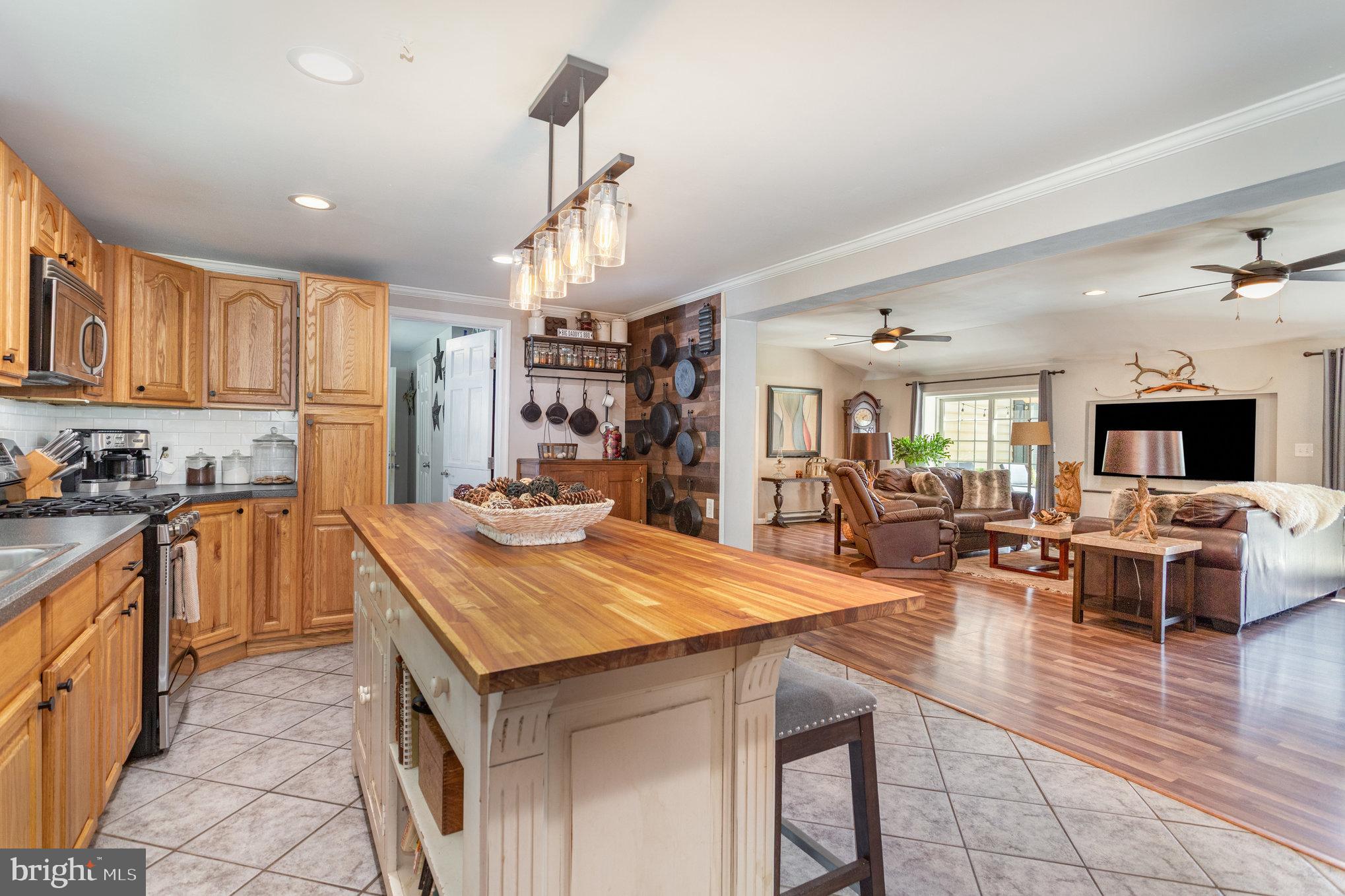 136 Greenwich Road Delta, PA 17314 - Photo 15 of 56 a living room with stainless steel appliances kitchen island granite countertop furniture and a kitchen view