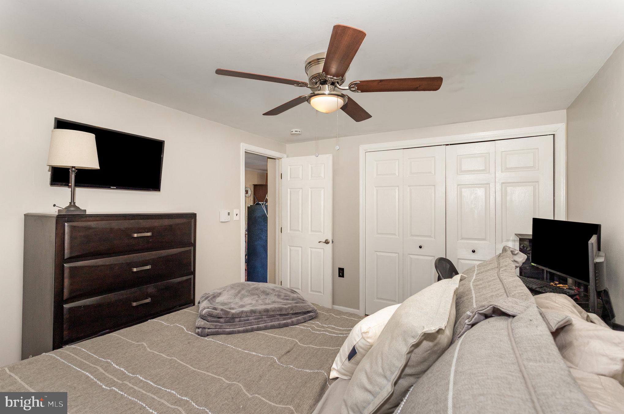 136 Greenwich Road Delta, PA 17314 - Photo 26 of 56 a bedroom with a bed and a flat screen tv