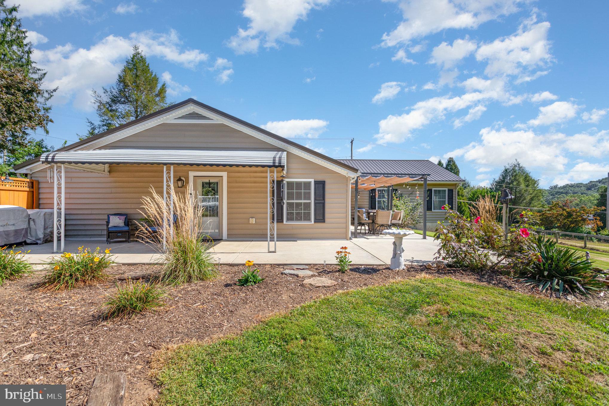 136 Greenwich Road Delta, PA 17314 - Photo 33 of 56 a front view of a house with garden