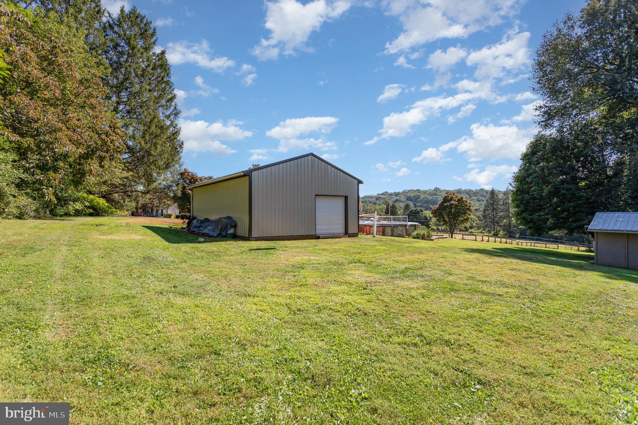 136 Greenwich Road Delta, PA 17314 - Photo 45 of 56 a view of a house with a yard