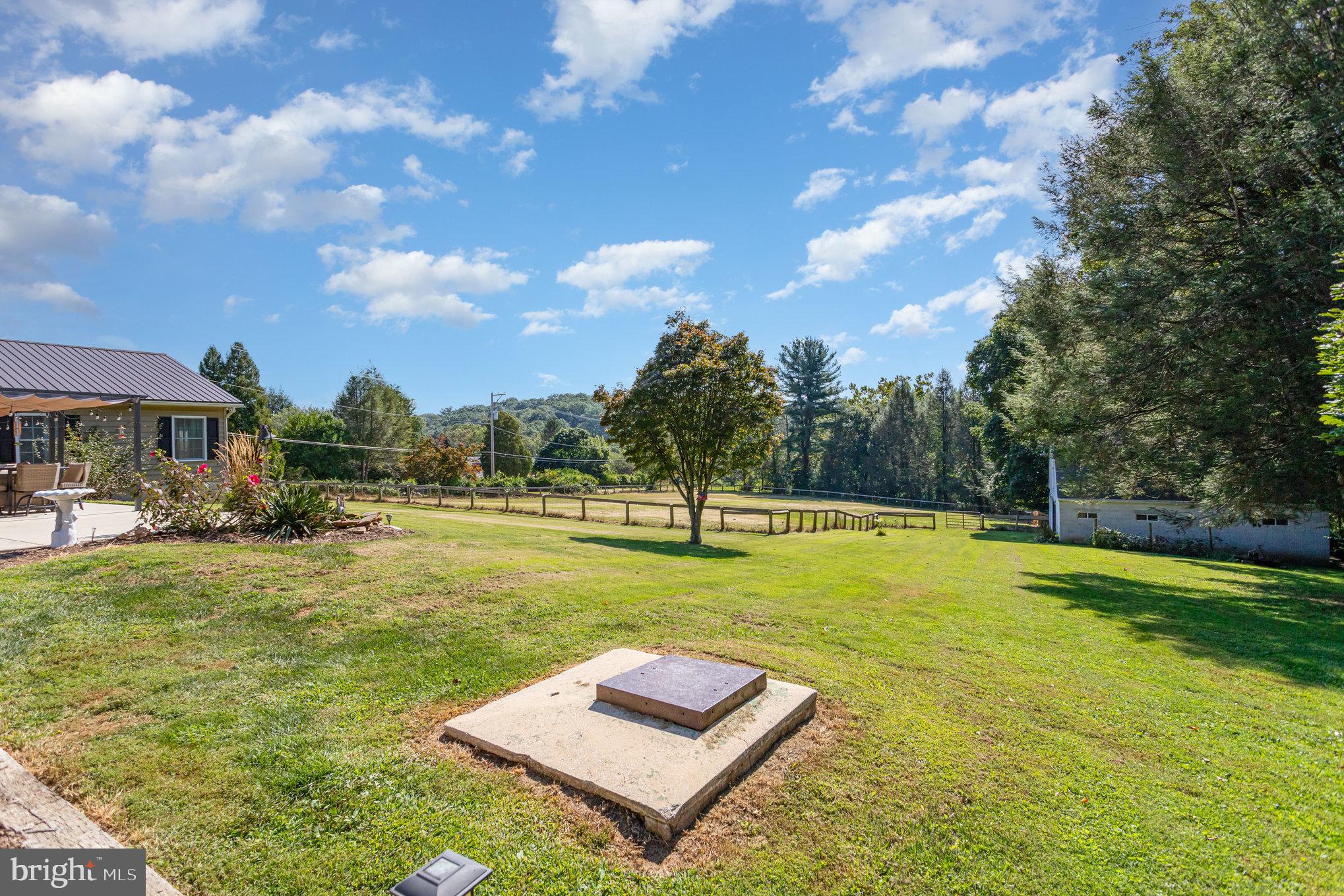 136 Greenwich Road Delta, PA 17314 - Photo 46 of 56 a view of a big yard with swimming pool and furniture