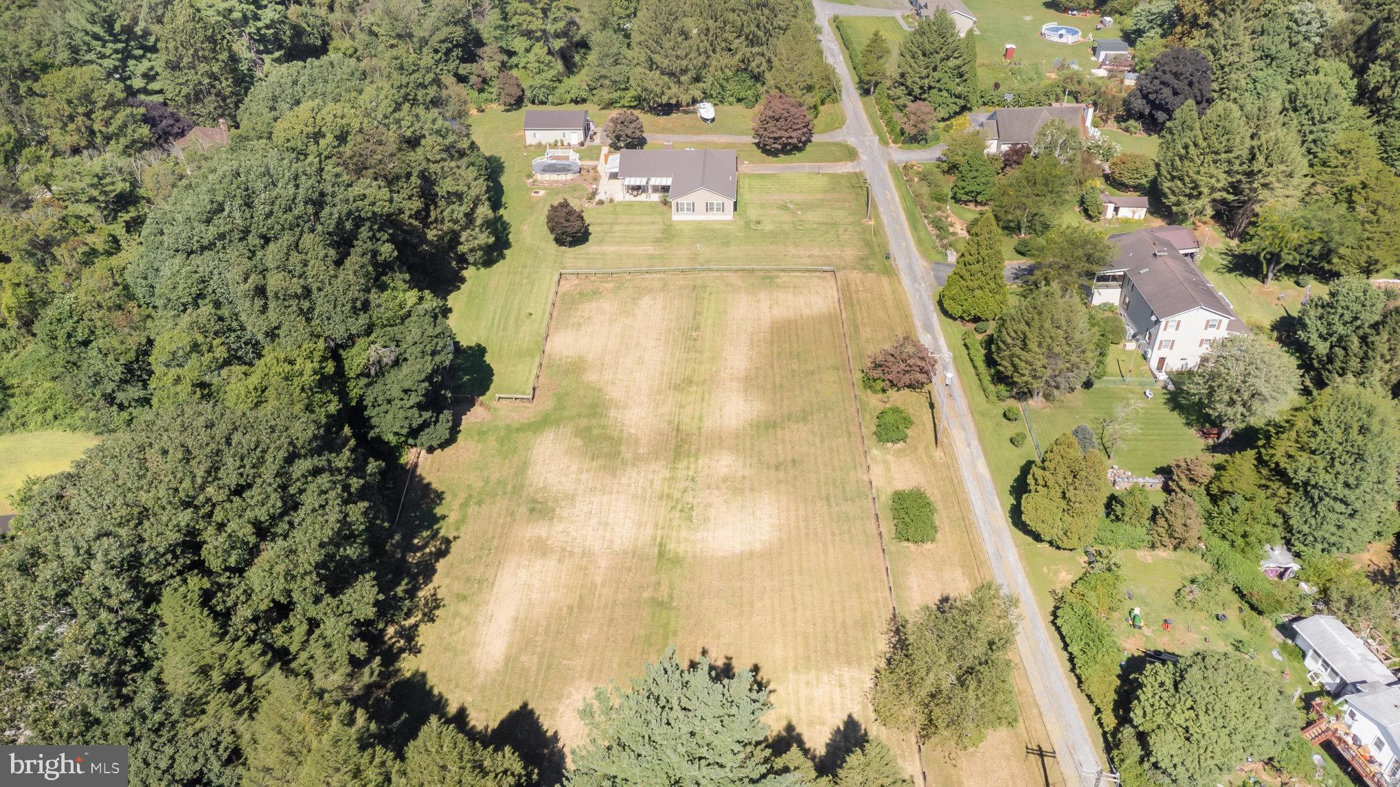 136 Greenwich Road Delta, PA 17314 - Photo 55 of 56 a building with a trees in front of it