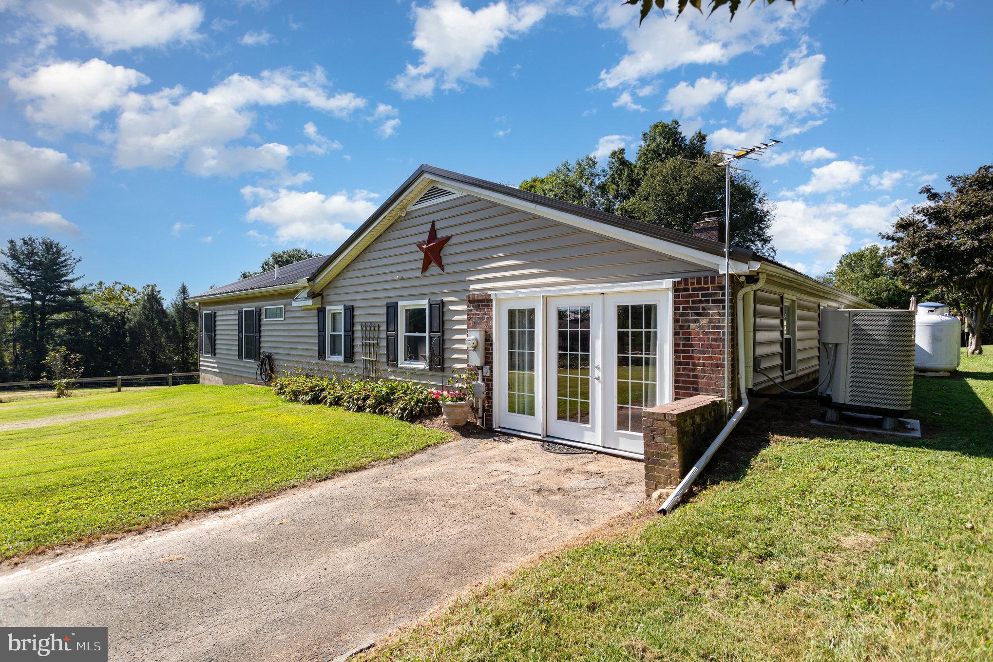 136 Greenwich Road Delta, PA 17314 - Photo 6 of 56 a view of a house with backyard and garden