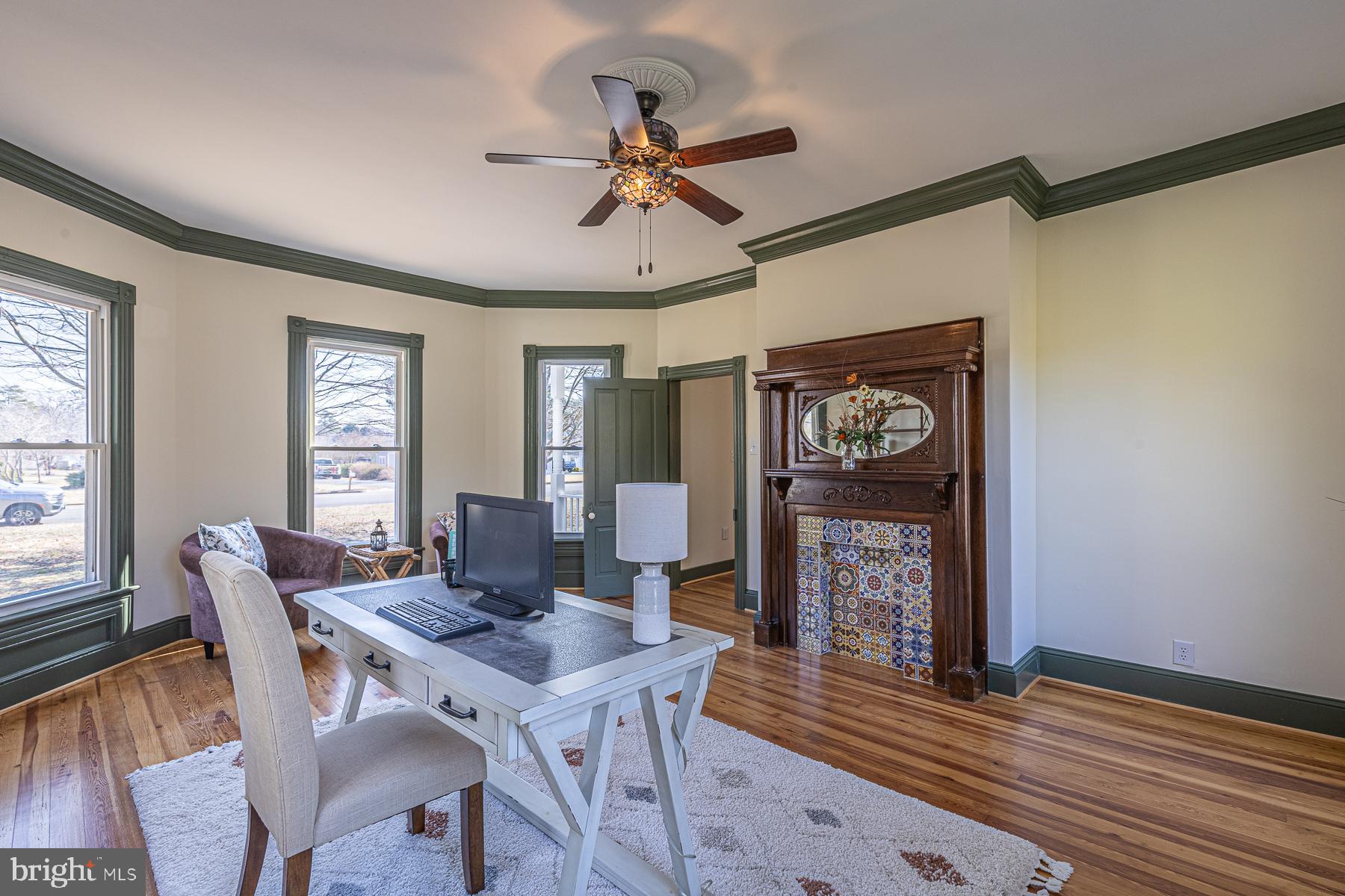 296 Beach Road White Stone, VA 22578 - Photo 21 of 51 a view of a dining room with furniture window and wooden floor