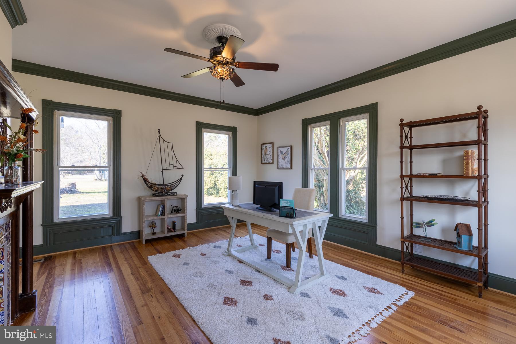 296 Beach Road White Stone, VA 22578 - Photo 23 of 51 a work room with furniture wooden floor and windows