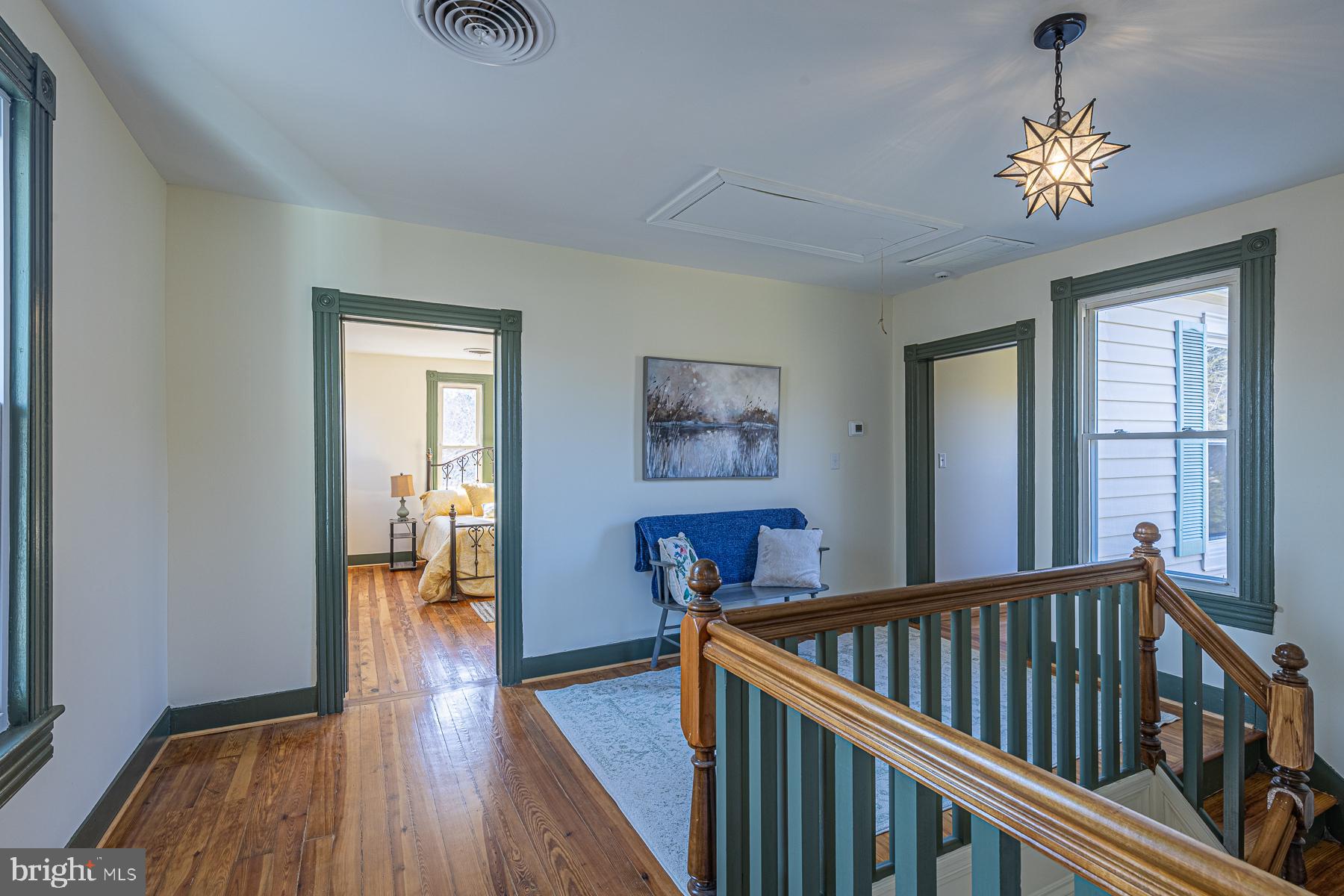 296 Beach Road White Stone, VA 22578 - Photo 27 of 51 a view of staircase with wooden floor and a window