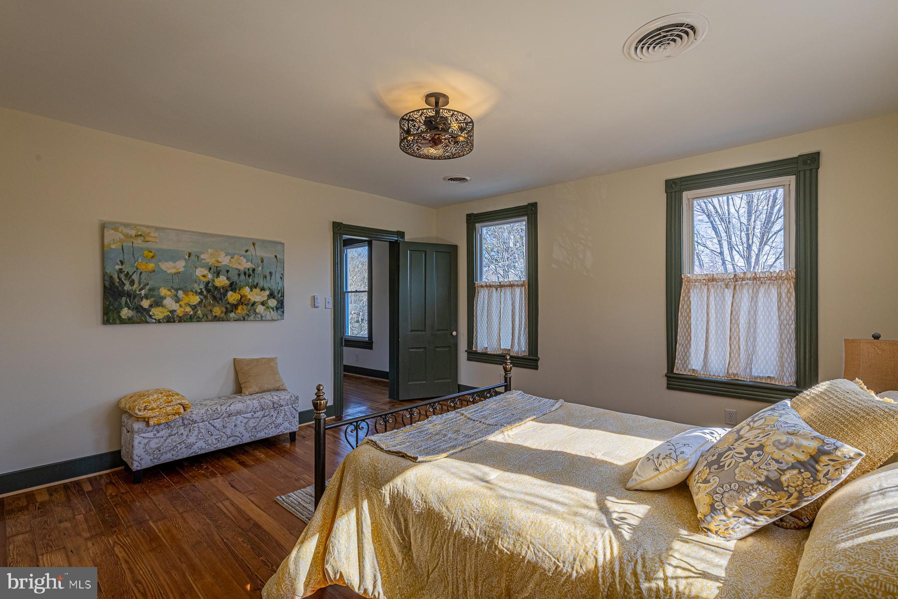 296 Beach Road White Stone, VA 22578 - Photo 29 of 51 a bedroom with bed and a window