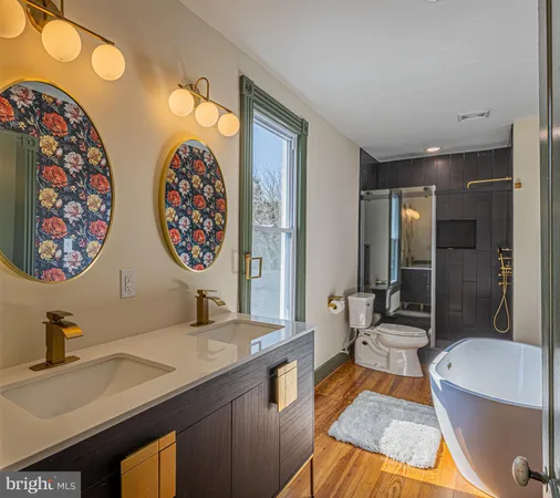 a bathroom with a toilet and a shower curtain