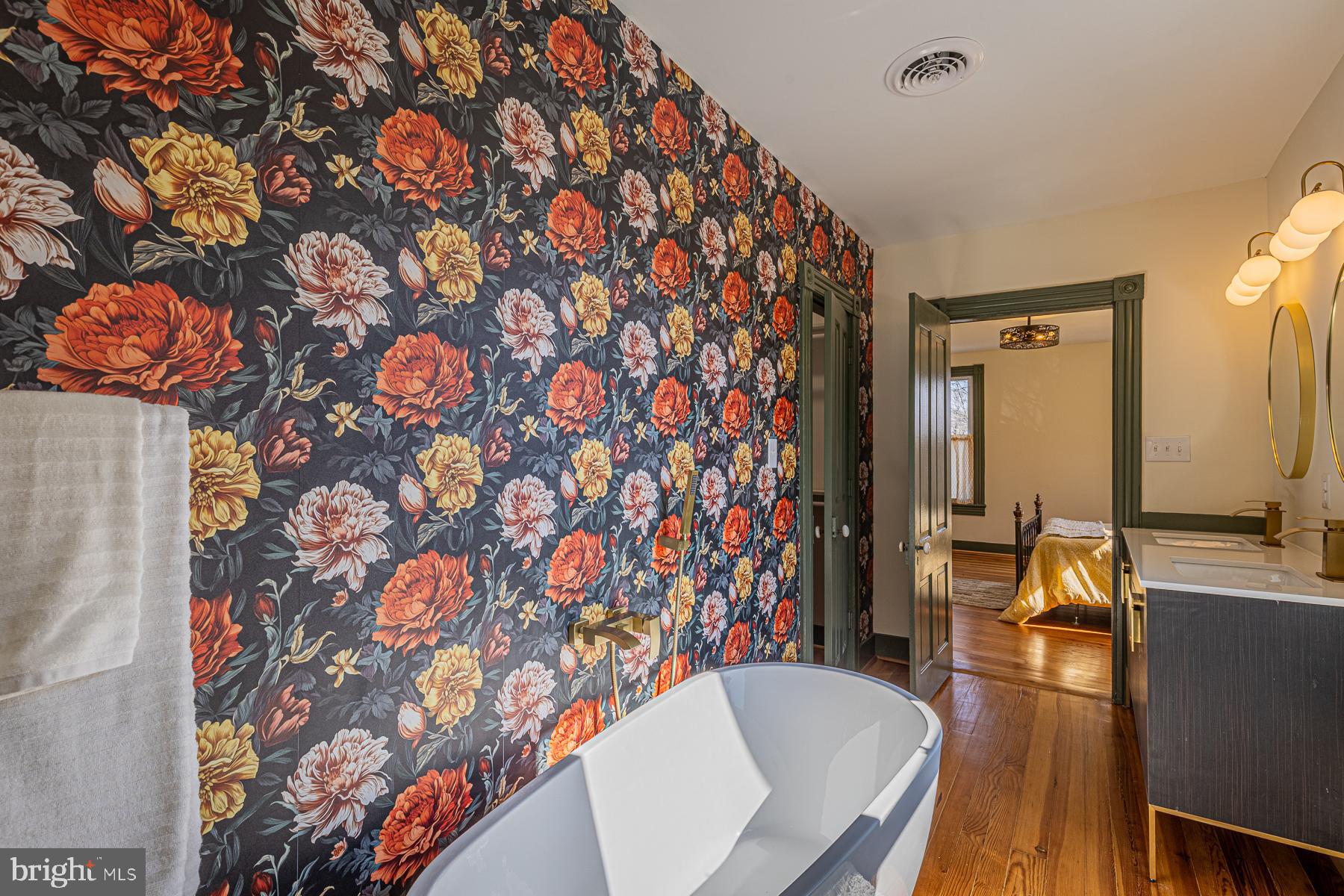 296 Beach Road White Stone, VA 22578 - Photo 32 of 51 a living room with furniture and wooden floor