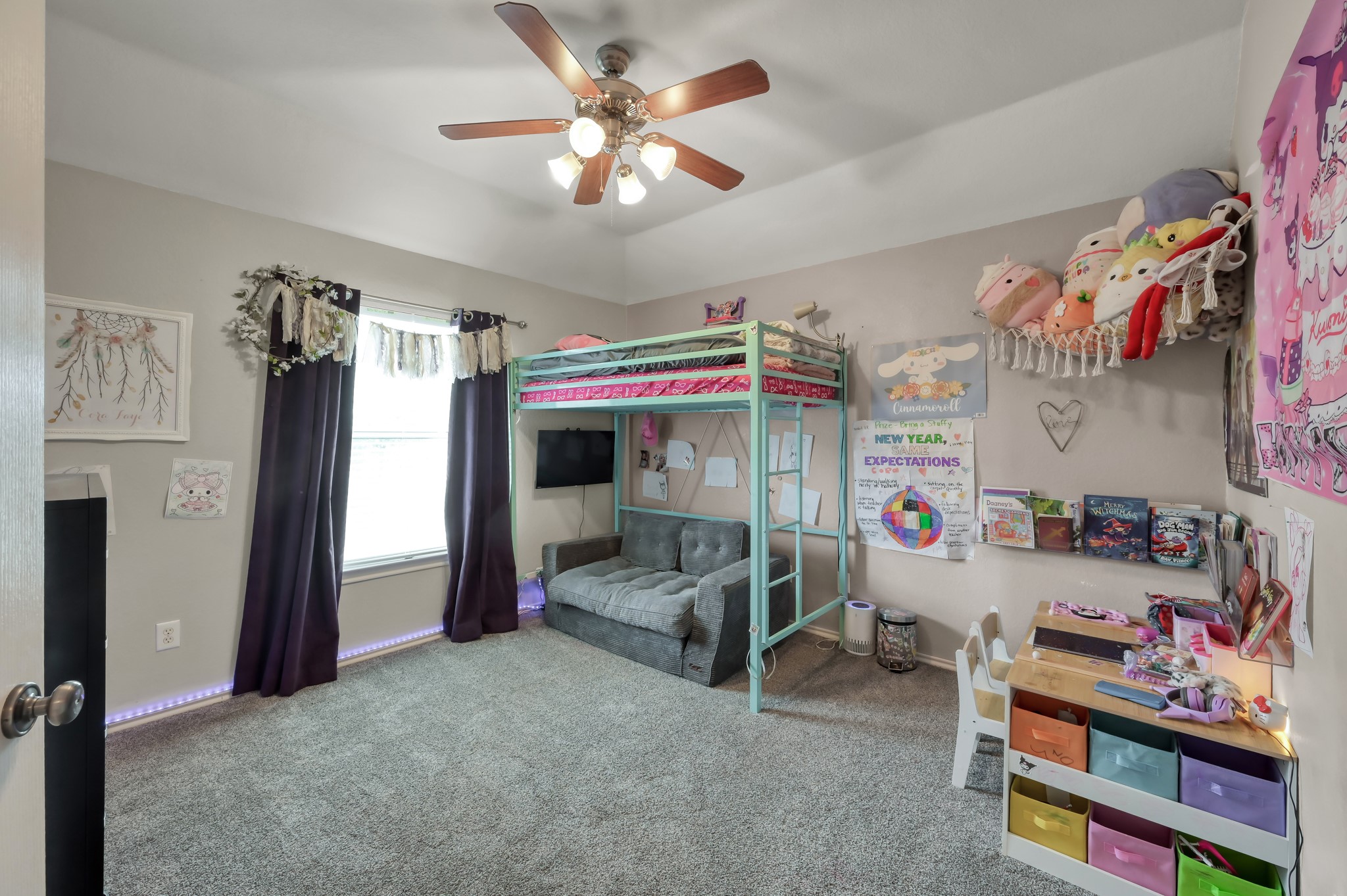 28522 Misty Cliff Lane Spring, TX 77386 - Photo 9 of 12 Charming secondary bedroom with vaulted ceilings, cozy carpeting, and playful design elements. Spacious layout provides room for sleep, study, and play areas.