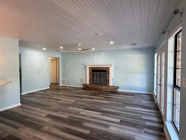 a kitchen with stainless steel appliances granite countertop a sink a refrigerator and a stove