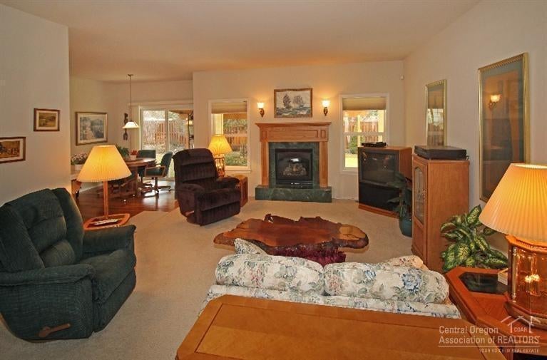 375 Southeast Soft Tail Loop Bend, OR 97702 - Photo 2 of 25 A large great room living area with gas