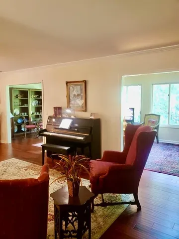 a kitchen with white cabinets stainless steel appliances and sink