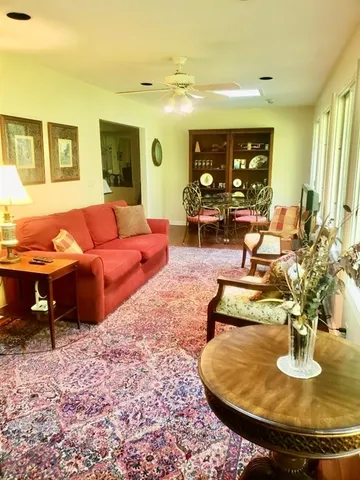 a kitchen with stainless steel appliances a stove a sink and a refrigerator