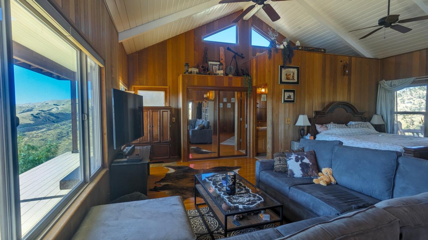 20473 Panoche Road Paicines, CA 95043 - Photo 16 of 19 a living room with furniture and a window