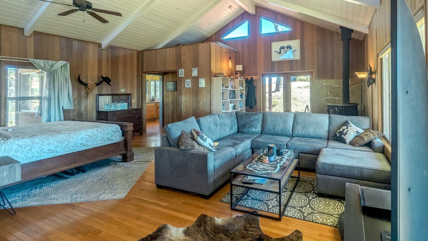 20473 Panoche Road Paicines, CA 95043 - Photo 17 of 19 a living room with furniture and a large window