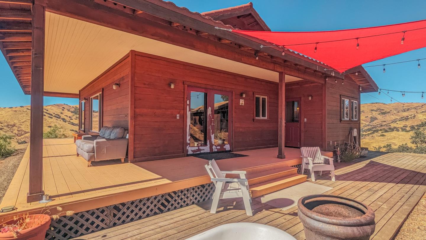 20473 Panoche Road Paicines, CA 95043 - Photo 6 of 19 a outdoor space with patio the couches and a dining table with chairs