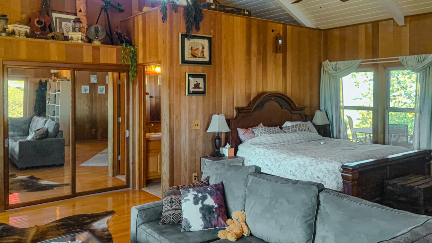 20473 Panoche Road Paicines, CA 95043 - Photo 8 of 19 a bathroom with a granite countertop sink and a mirror