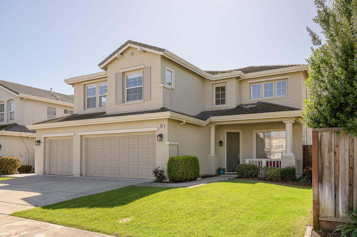 862 Padova Drive Gilroy, CA 95020 - Photo 1 of 1 a front view of a house with yard and green space