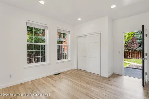 an empty room with windows