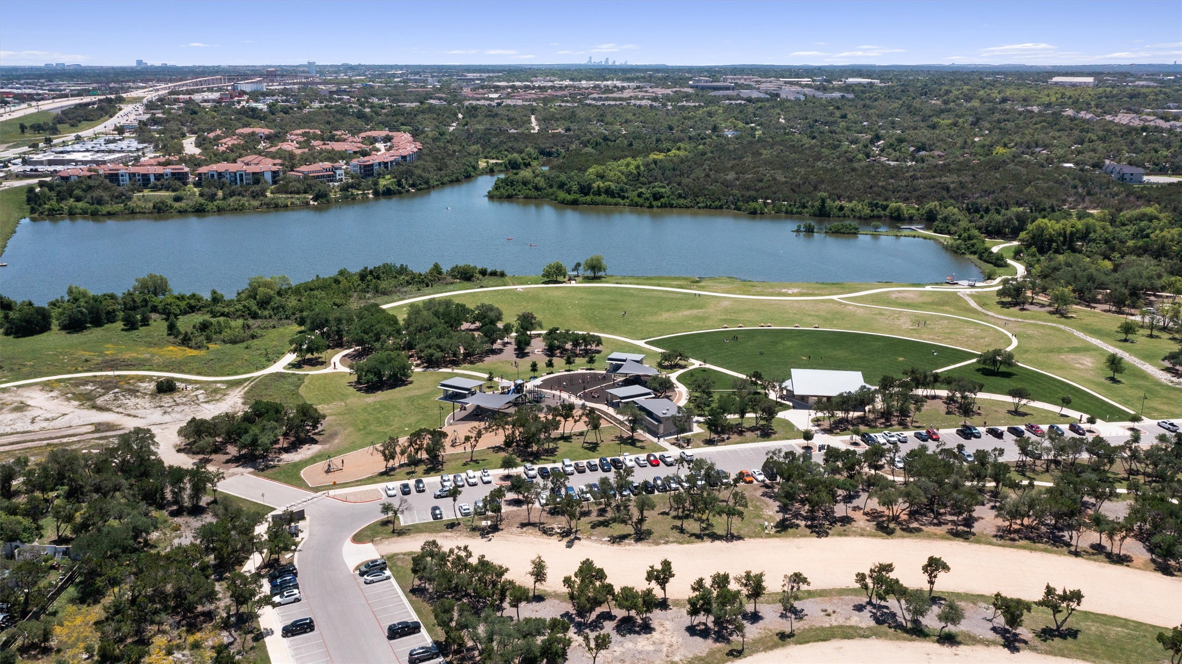 590 Old Mill Road, Unit 153 Cedar Park, TX 78613 - Photo 3 of 40 an aerial view of residential houses with outdoor space