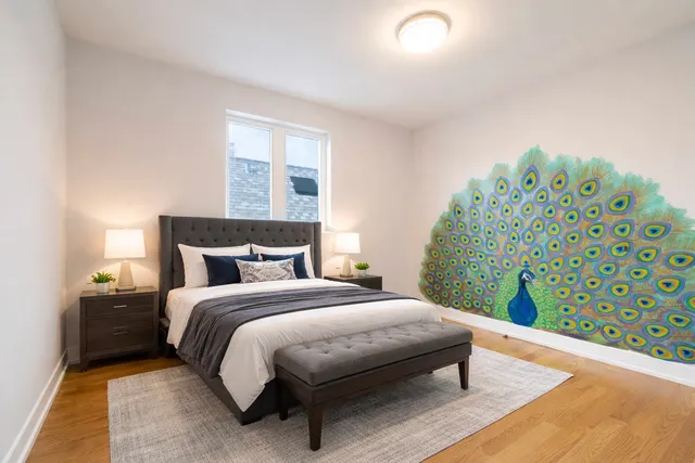 a bedroom with a bed and a couch