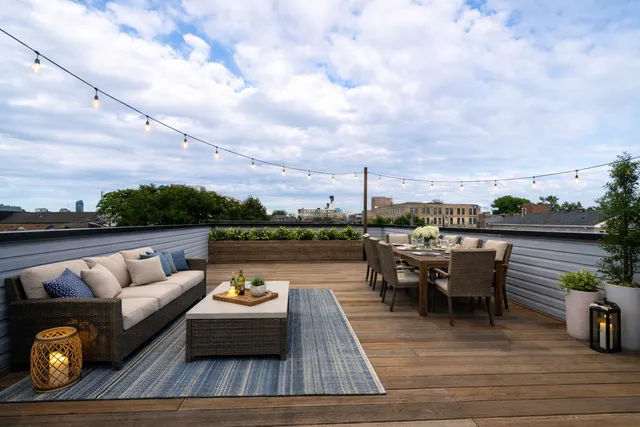 a view of a balcony with city view