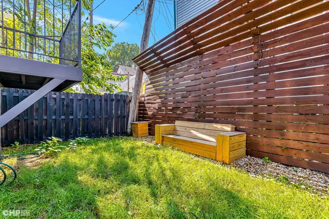 a picture of a bench in front of a door