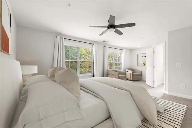 an empty room with a empty space and windows