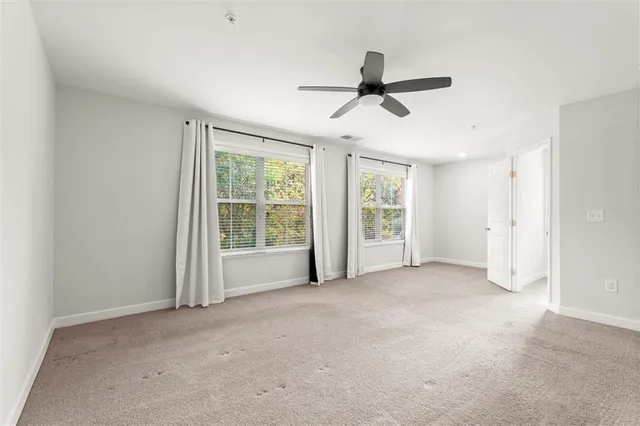 a bathroom with a sink double vanity and a mirror