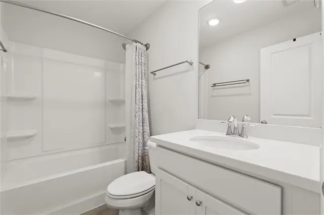 a utility room with washer and dryer