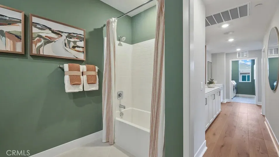 1709 Lychee Street Fullerton, CA 92835 - Photo 14 of 25 view of a hallway with wooden floor and windows