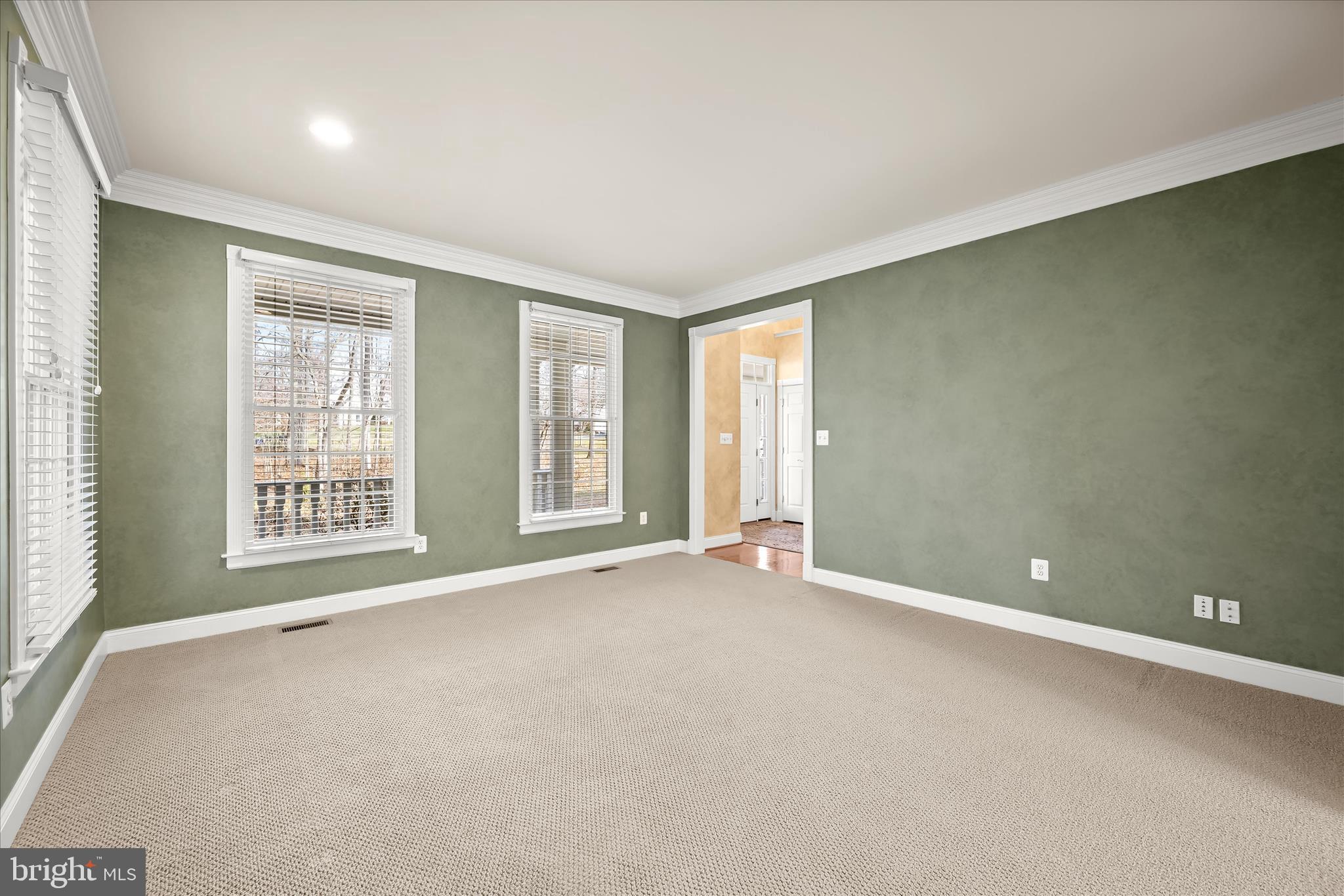 15286 Ridge Hunt Drive Woodbine, MD 21797 - Photo 12 of 100 Formal Living Features Crown Molding & Neutral Car