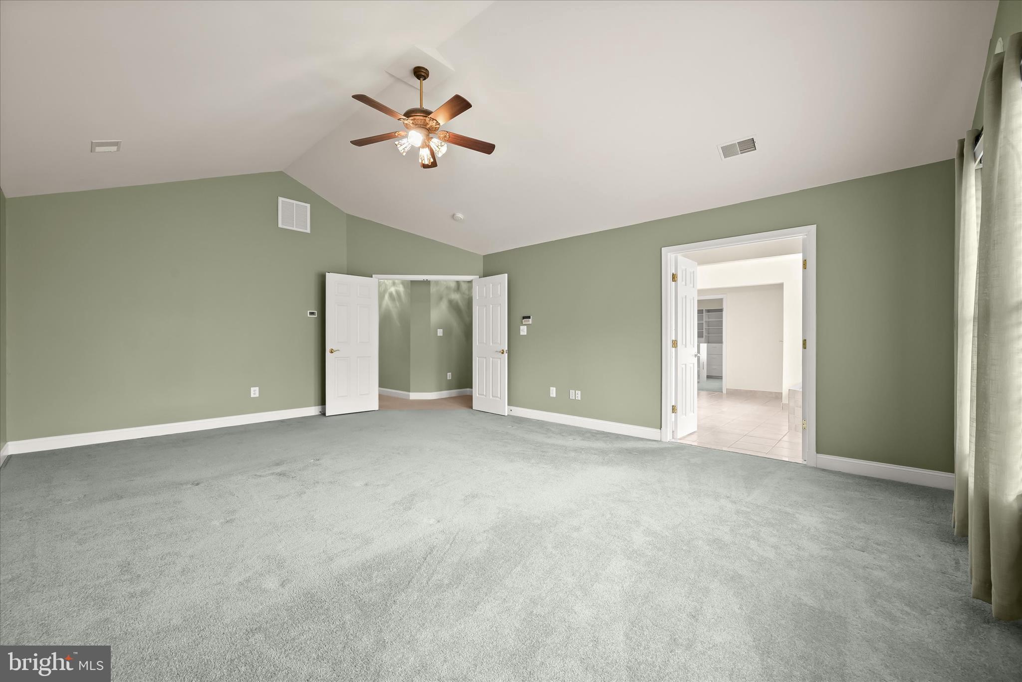15286 Ridge Hunt Drive Woodbine, MD 21797 - Photo 47 of 100 a view of a livingroom with a ceiling fan and window