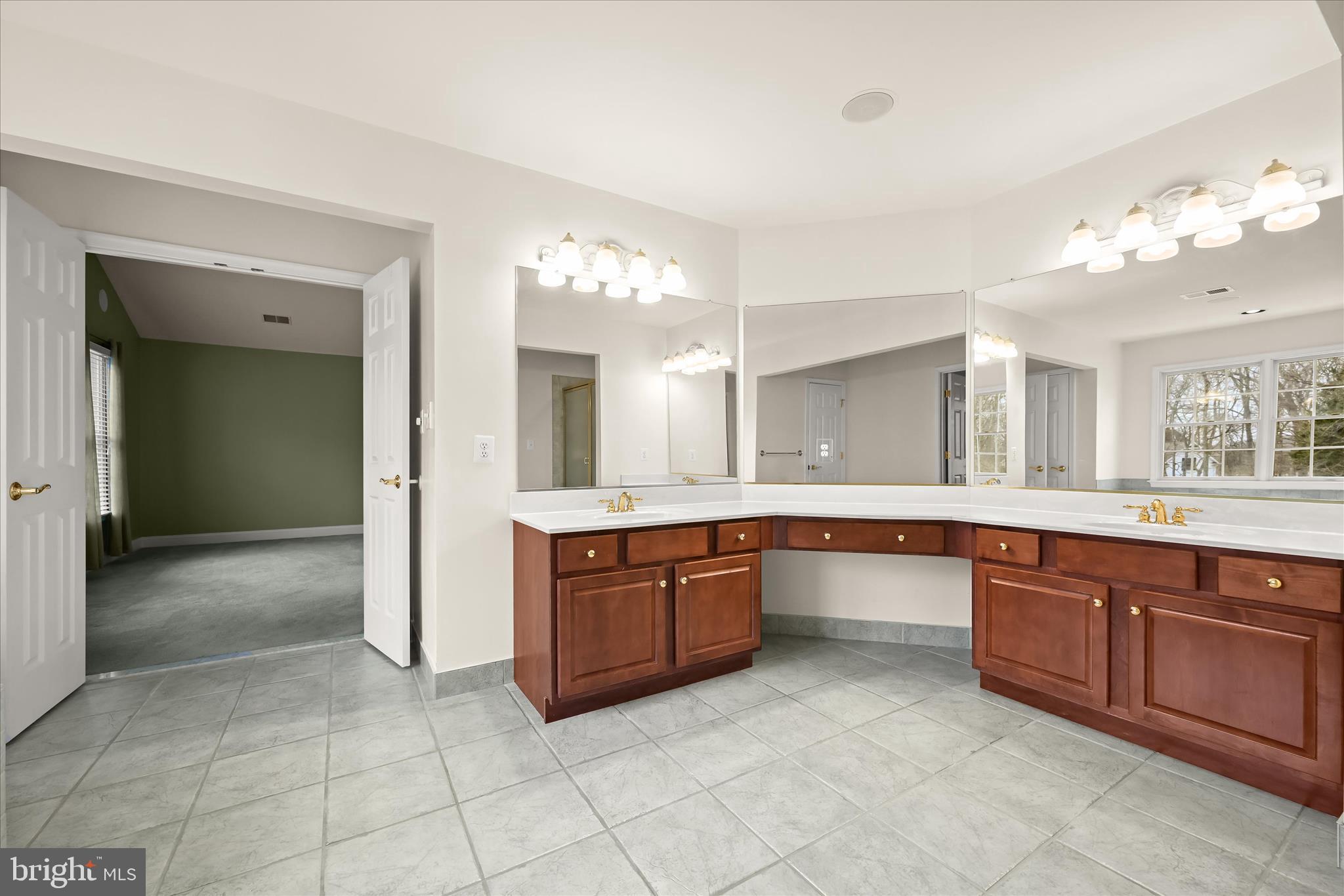 15286 Ridge Hunt Drive Woodbine, MD 21797 - Photo 51 of 100 a large bathroom with a large tub and sink