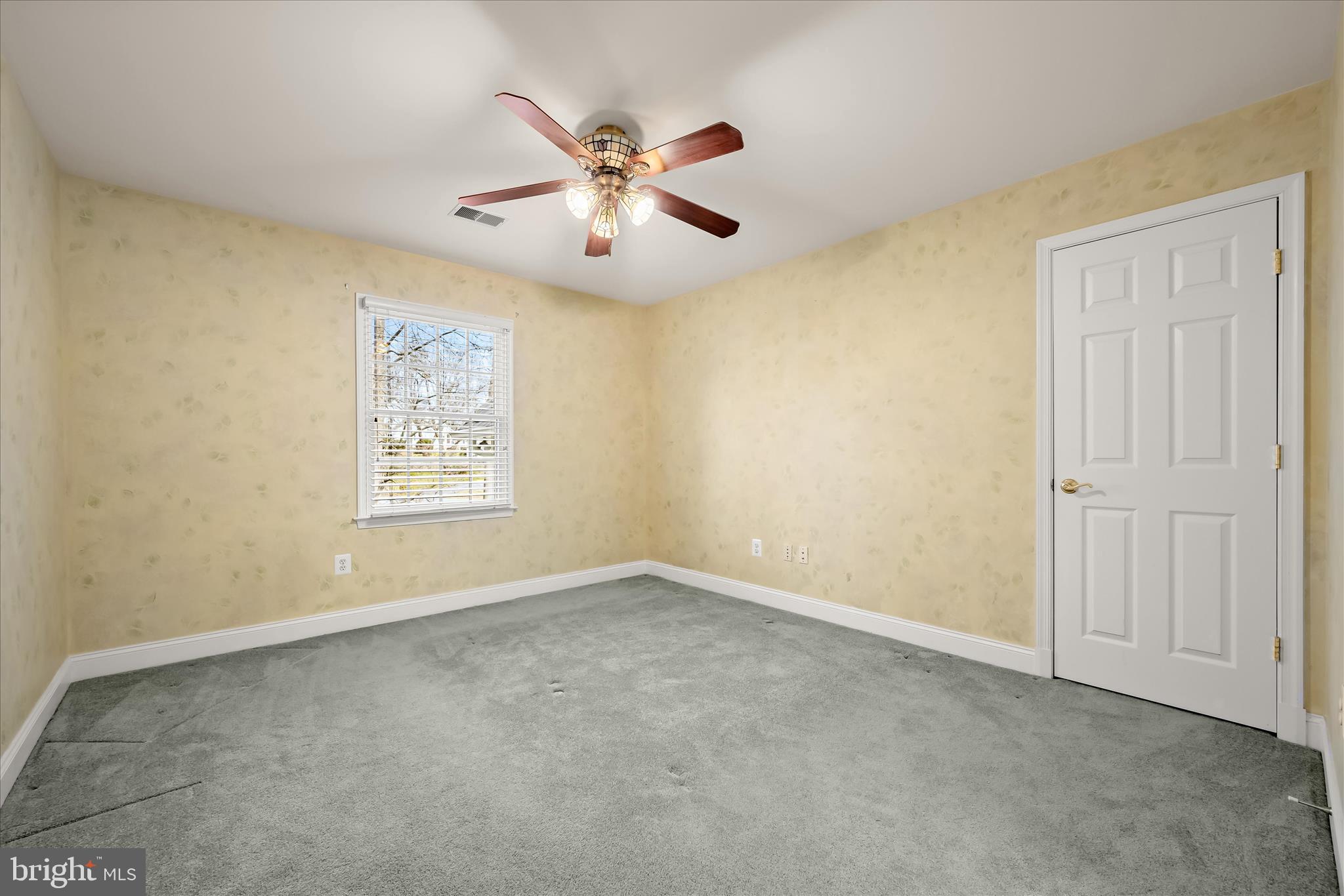 15286 Ridge Hunt Drive Woodbine, MD 21797 - Photo 64 of 100 an empty room with windows and fan