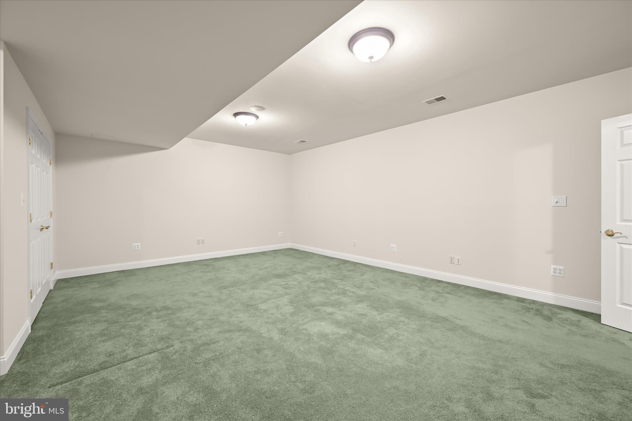 15286 Ridge Hunt Drive Woodbine, MD 21797 - Photo 76 of 100 an empty room with a natural light