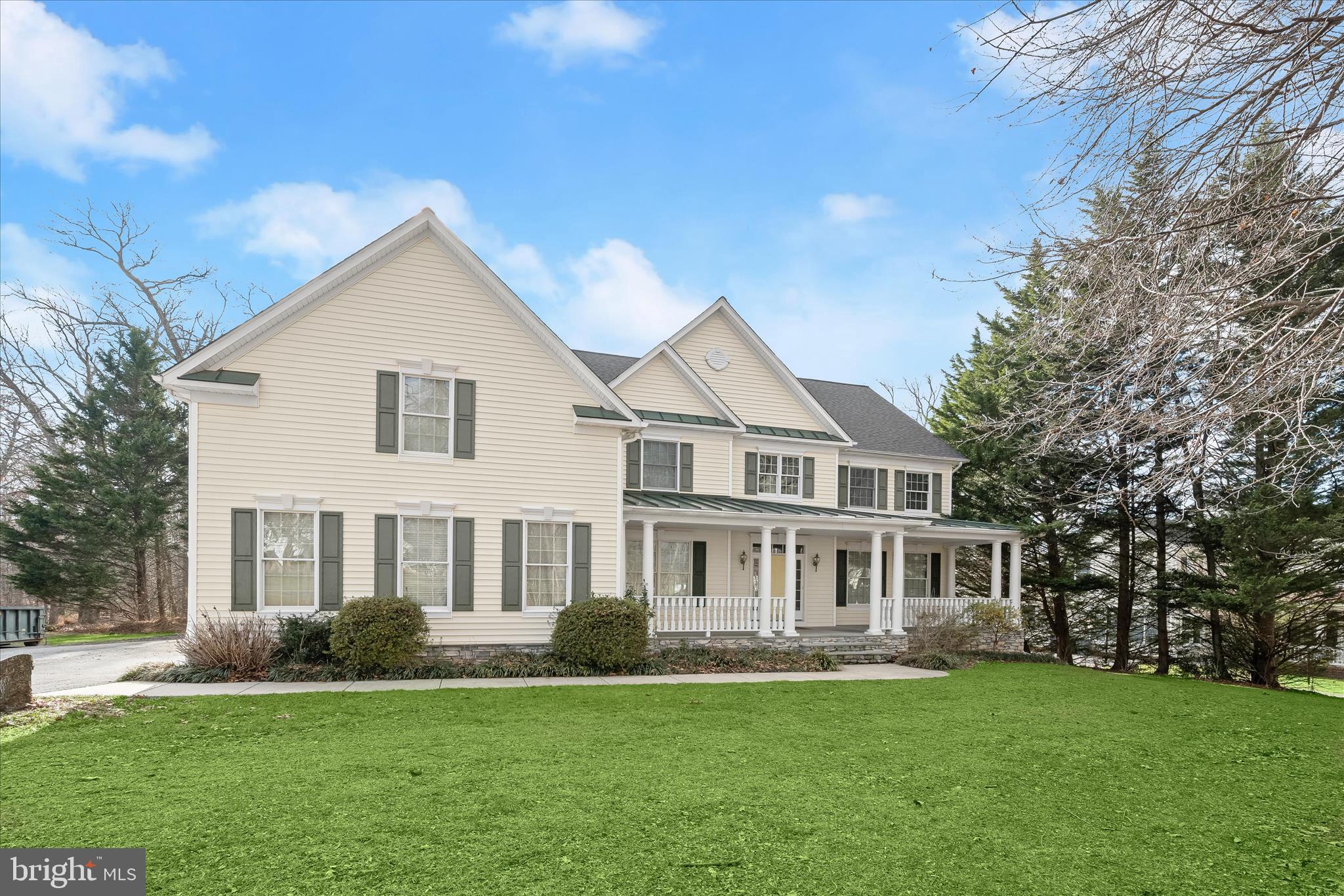 15286 Ridge Hunt Drive Woodbine, MD 21797 - Photo 85 of 100 a front view of a house with a garden
