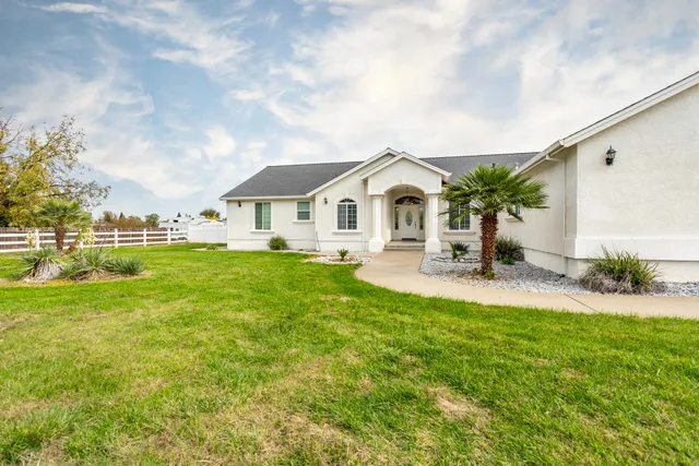 a view of swimming pool with seating area