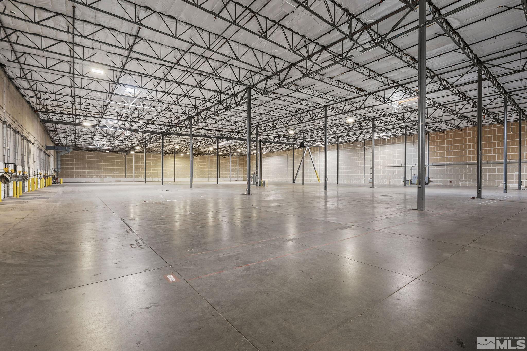 1190 Trademark Drive, Unit 108 108 Reno, NV 89521 - Photo 11 of 20 a view of a hall with an empty room