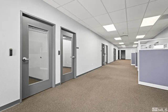 a view of a hallway with staircase