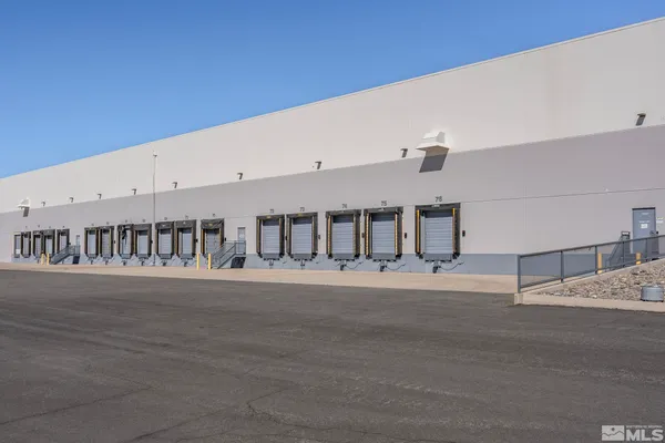 a white building with a street
